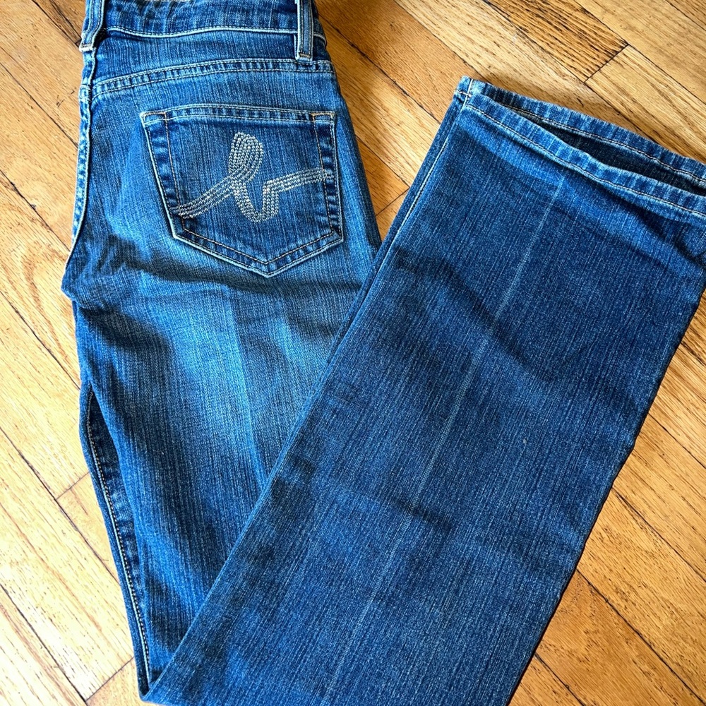 Bebe size 26 boot cut bottom jeans